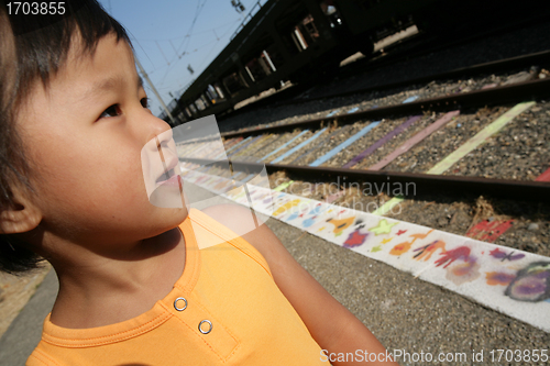 Image of Girl and railway track