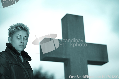 Image of woman and cross 