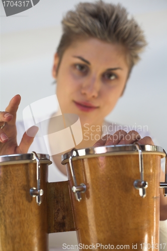 Image of woman and guitar