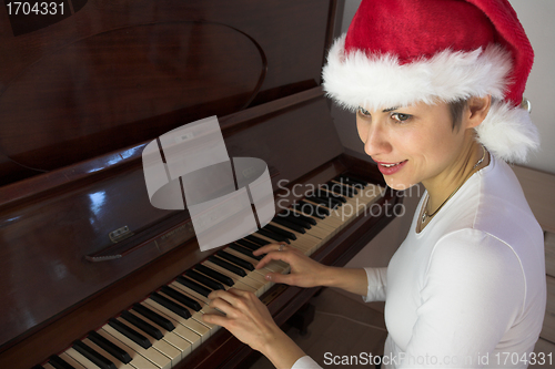 Image of woman and piano