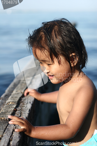 Image of child  and water