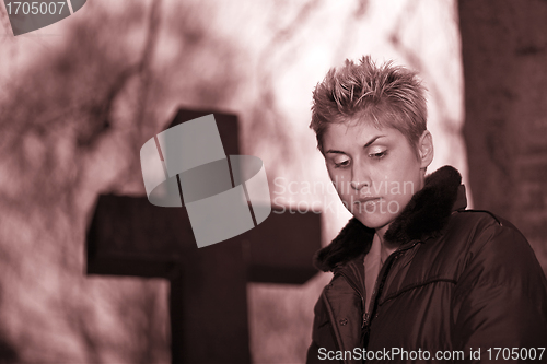Image of woman and cross 