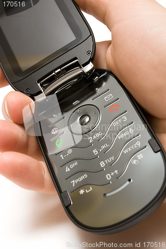 Image of Holding an Open Cell Phone