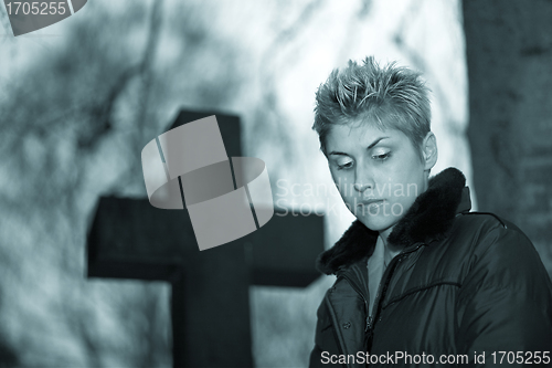 Image of woman and cross 