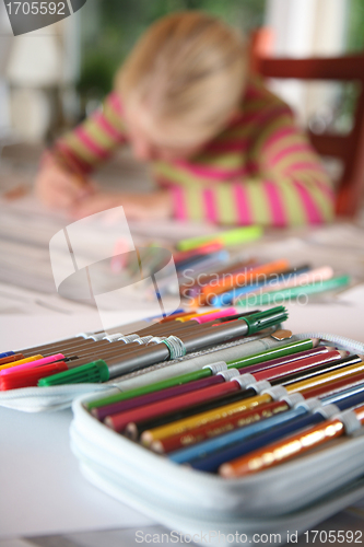 Image of  child  reading writting