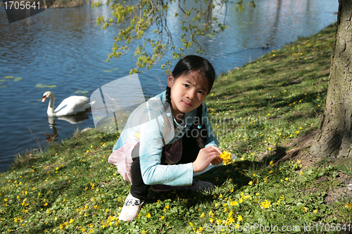 Image of child in flower