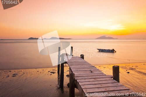 Image of Sunset pier along coast