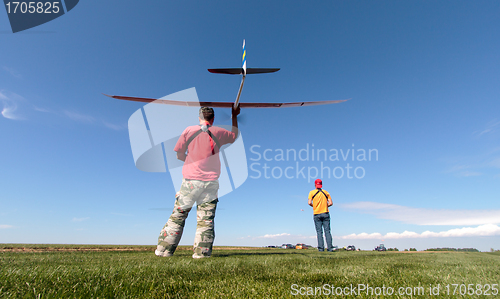 Image of Man launches into the sky RC glider