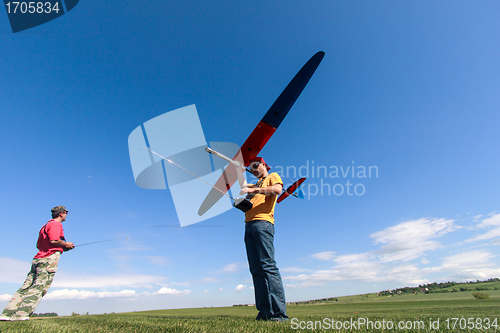 Image of Man launches into the sky RC glider