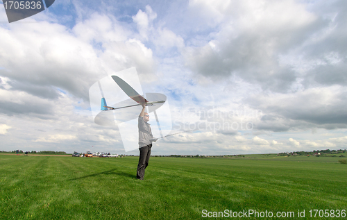 Image of Man launches into the sky RC glider