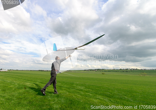 Image of Man launches into the sky RC glider