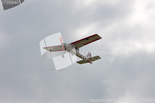 Image of RC model airplane flying in the sky