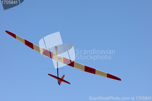 Image of RC glider flying in the blue sky