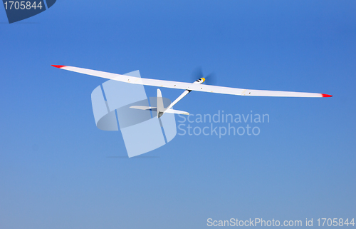 Image of RC glider flying in the blue sky