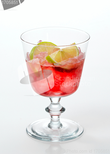 Image of red cold drink with ice and lime