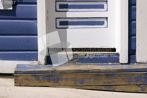 Image of Close up on a Door Step of an Old Door
