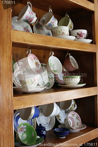 Image of China Cabinet full of Cups