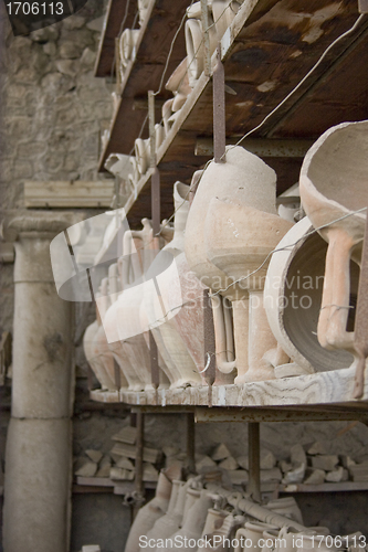 Image of Ancient Stone Vases on Shelf