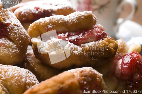 Image of Dough with marmelade on wooden board