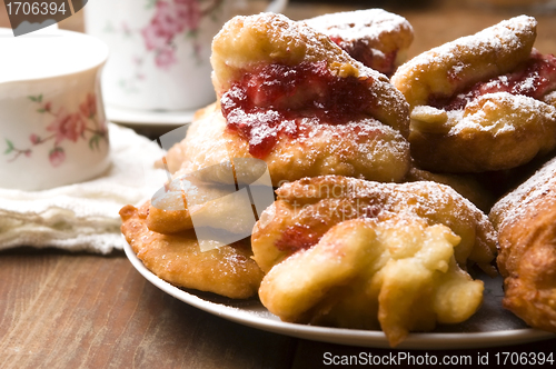 Image of Dough with marmelade on wooden board