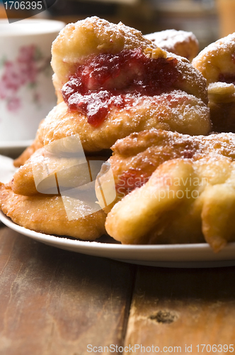 Image of Dough with marmelade on wooden board