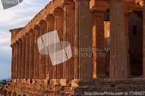 Image of Colonnade of ancient Concordia temple in Agrigento, Sicily, Italy at sunset