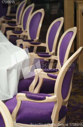 Image of Luxurious Purple Chairs in Formal Dining Room
