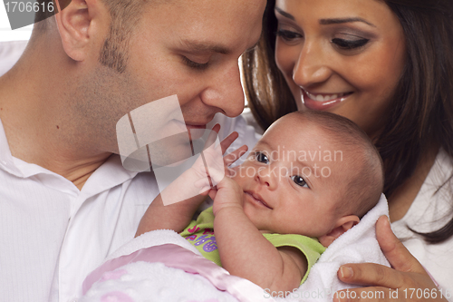 Image of Mixed Race Young Couple with Newborn Baby