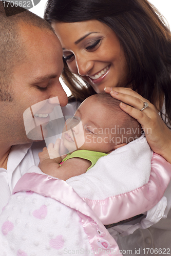 Image of Mixed Race Young Couple with Newborn Baby