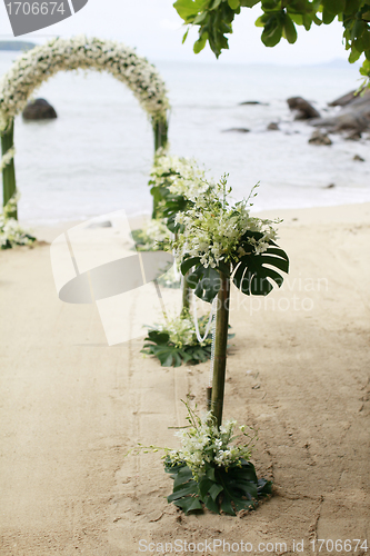 Image of Beautiful beach wedding set-up.