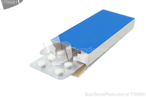 Image of Pills tablets in open package on white background