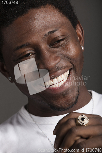 Image of Young man laughing