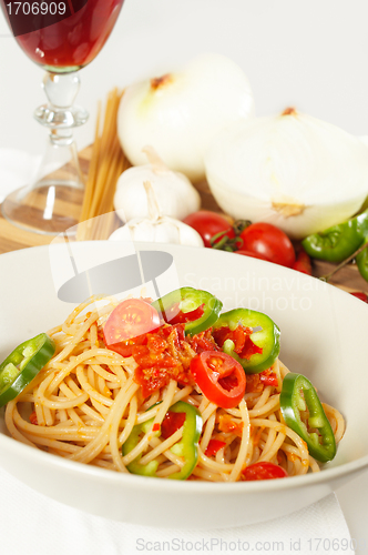 Image of spicy italian pasta tomato and chili peppers sauce