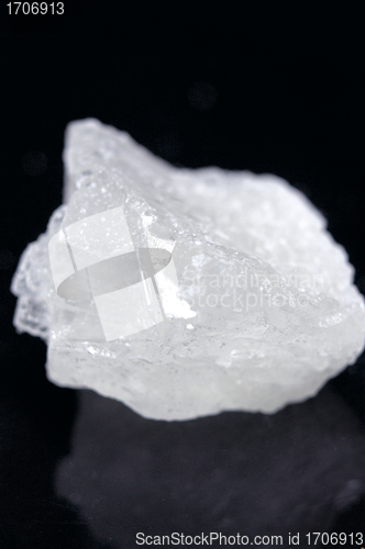 Image of pieces of rock sugar crystal over black
