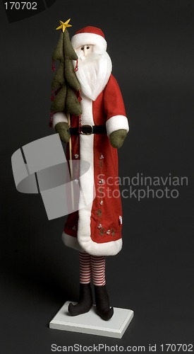 Image of santa claus with tree