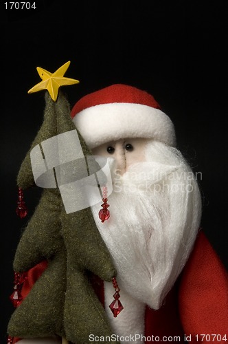 Image of santa claus with tree