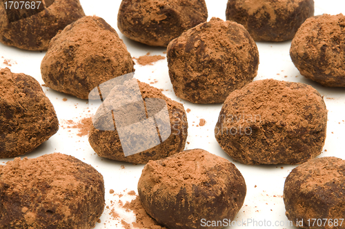 Image of Bunch of chocolate truffles with cocoa powder