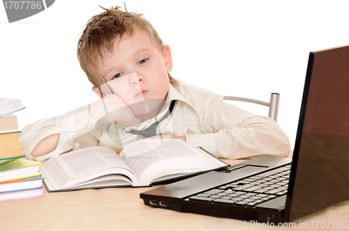 Image of pupil with book