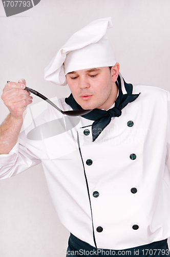 Image of chef with large spoon