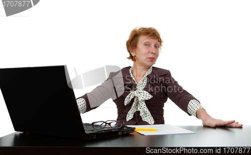 Image of middle-aged woman at a computer