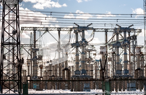 Image of Electric pylons against blue sky