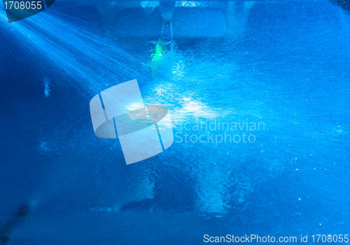 Image of Washing a car with water