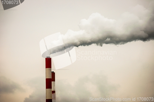 Image of Big chimney with smoke 