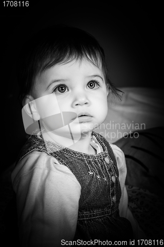Image of Small girl looking surprised