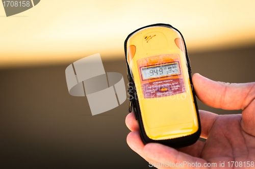 Image of Geiger counter in hand