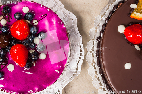 Image of Delicious cakes on marble table