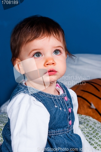 Image of Small girl looking surprised