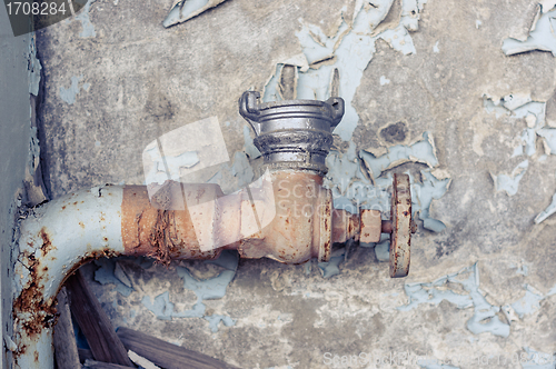 Image of Old rusty tap closeup