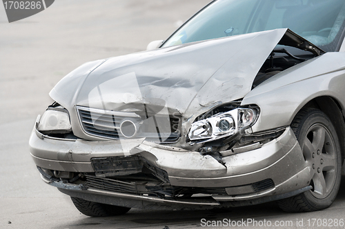 Image of Damaged car on the road