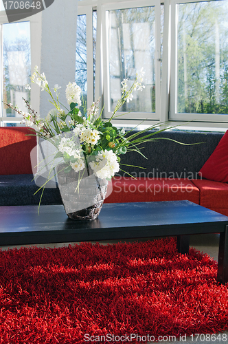 Image of Vase with flowers in interior rooms 
